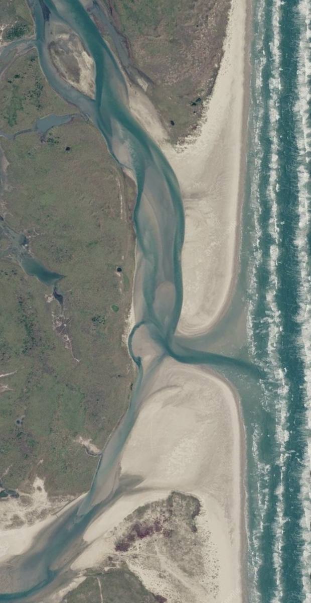 Aerial view of Cedar Bayou Pass — one of Texas' last wild tidal passes